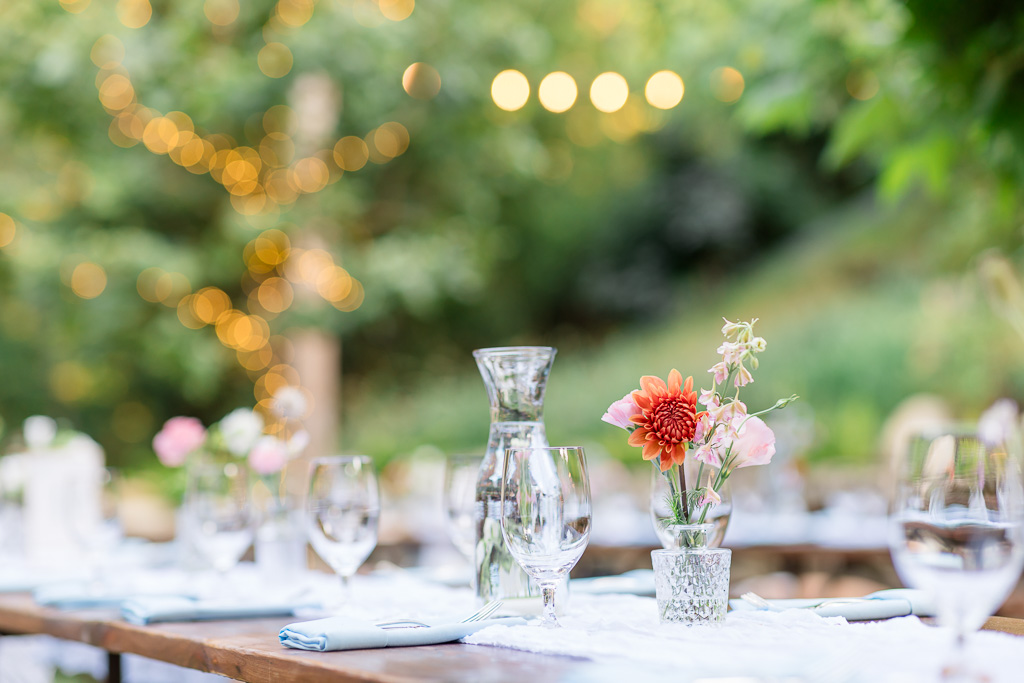 outdoor wedding reception table with string lights