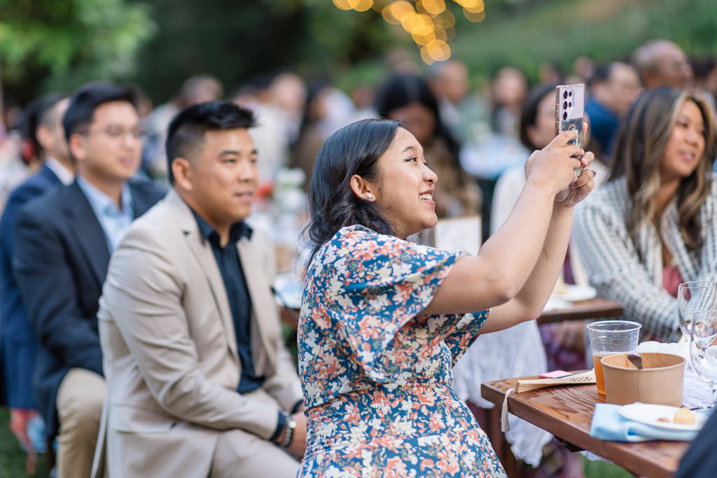 guests taking a photo during reception