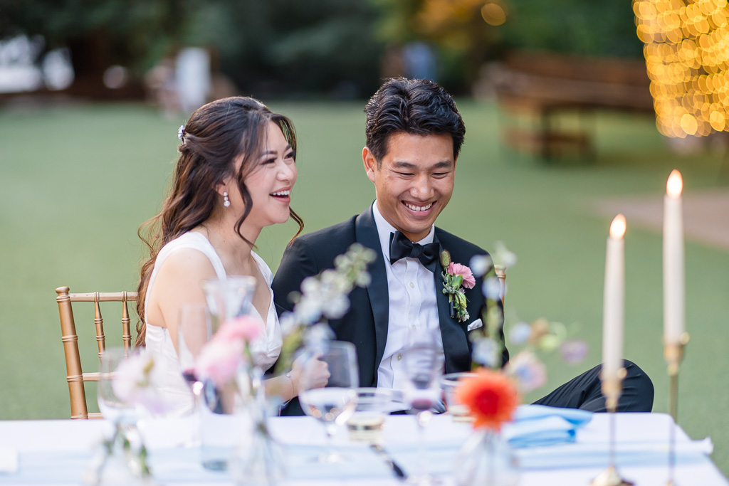 fun moment between the bride and groom