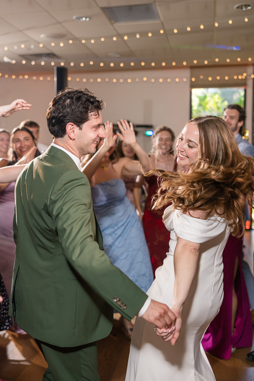 open dancing with the bride and groom at the center