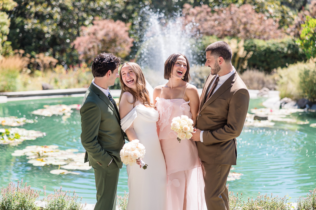 candid photo of bride and groom and a pair of their friends