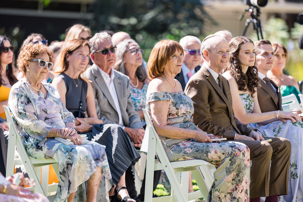 bride's family seated in the audience during wedding ceremony
