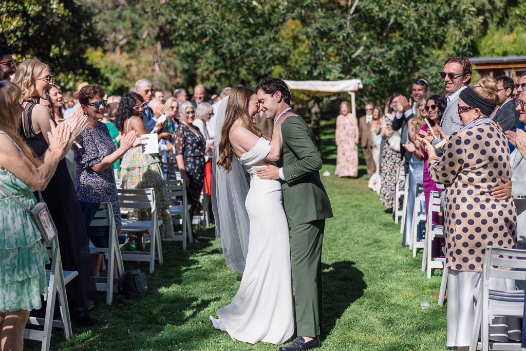 a cute moment at the end of the aisle