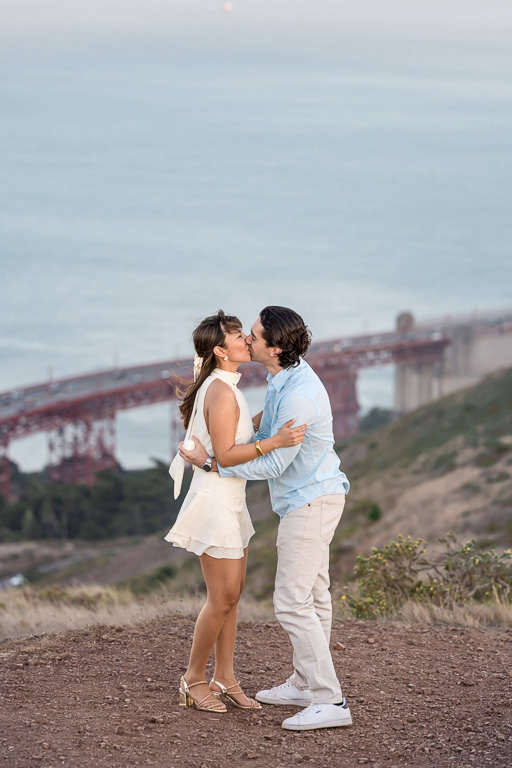 kissing and embracing after successful marriage proposal