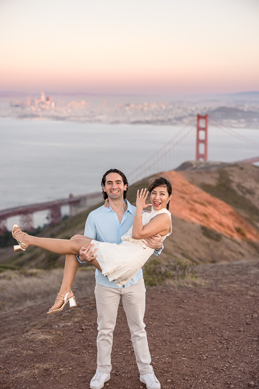 a cute fun photo showing off new engagement ring