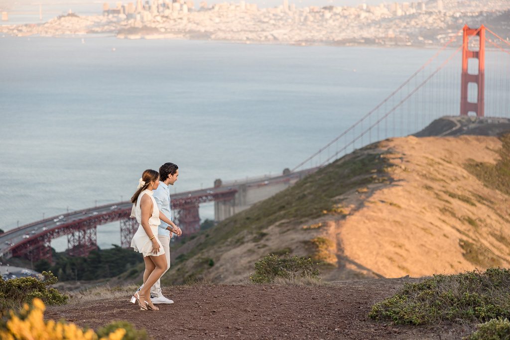 walking over to the best view of the Golden Gate Bridge for a romantic proposal