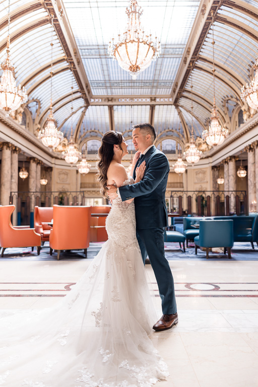 wedding photo in the atrium of the Palace Hotel