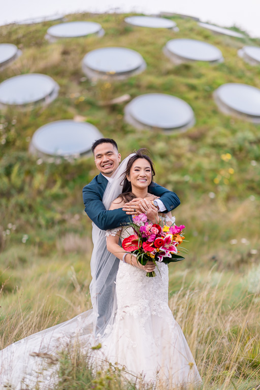 portrait of the newlyweds on the Cal Academy rooftop
