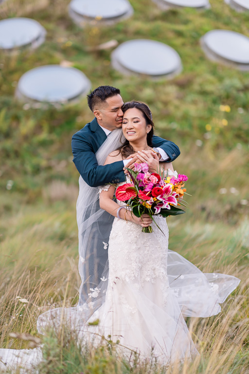wedding photo on the living roof of Cal Academy at the mounds and skylights