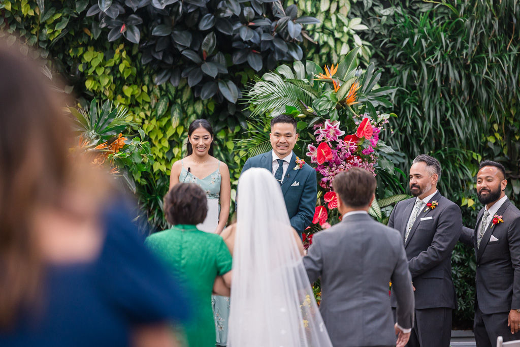 groom receiving the bride at the ceremony