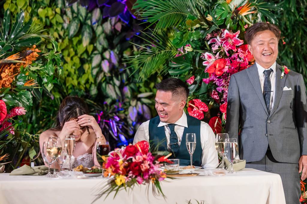 bride trying to hide during embarassing part of speech