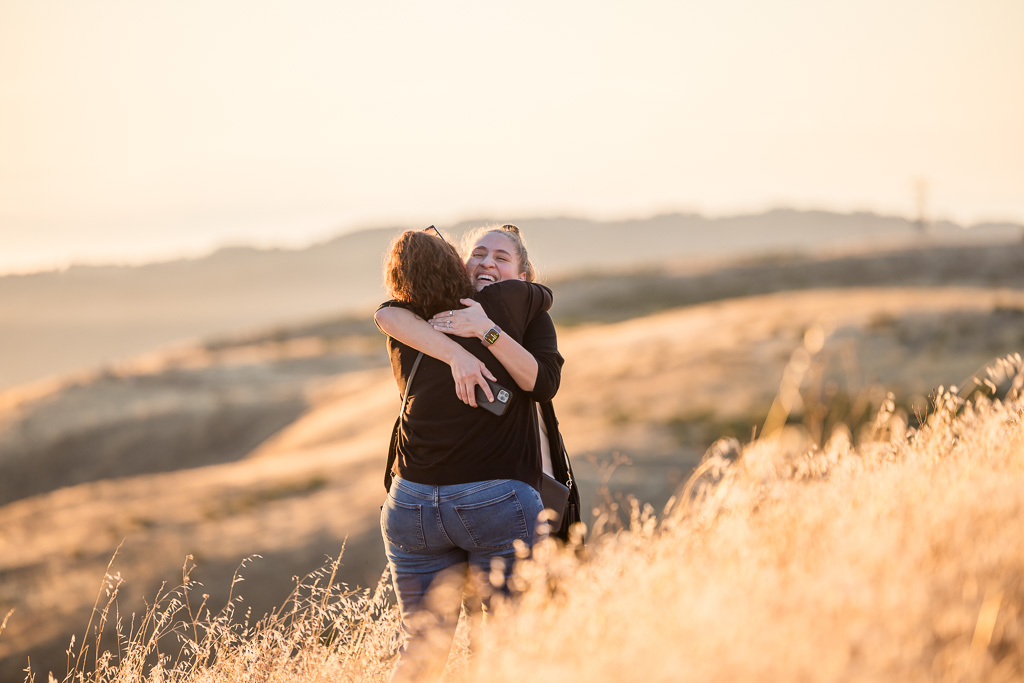 a hug to celebrate recent engagement