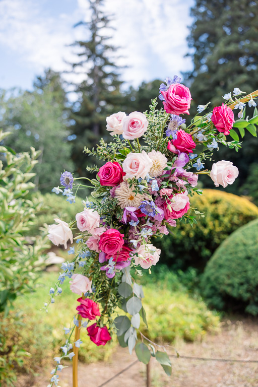 flowers decorating the ceremony arch