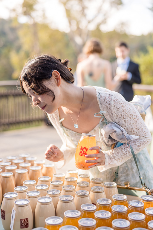 a wedding guest picking up Fantasia boba at the boba table