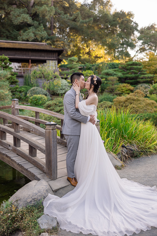 wedding portrait near a wooden bridge