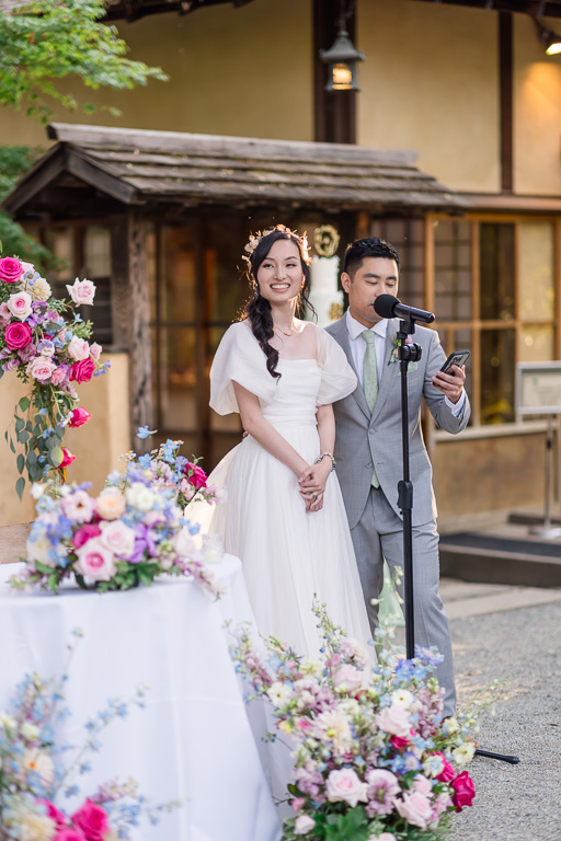 bride and groom giving a welcome speech