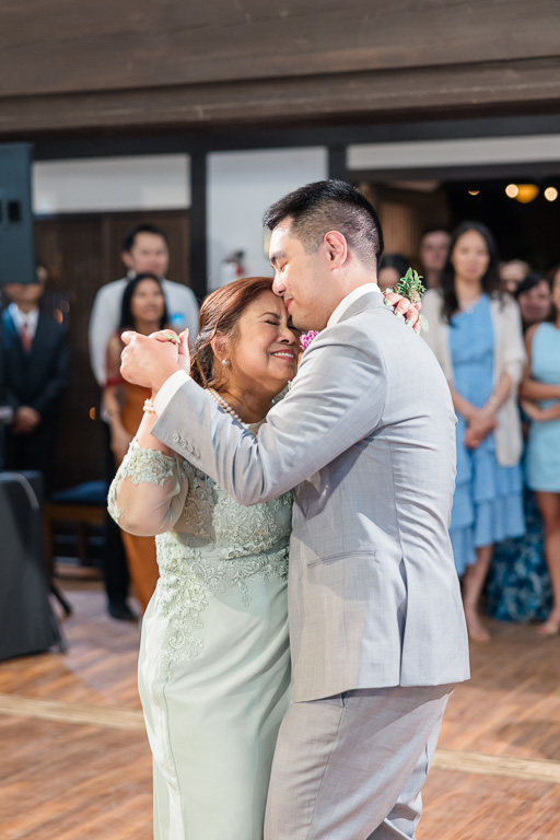 cute moment of groom and her mom sharing a dance