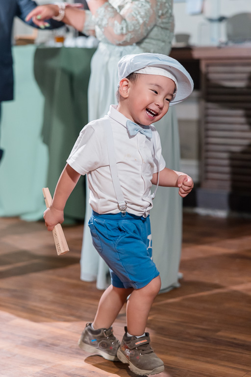 a little boy on the dance floor