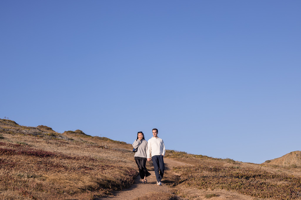 walking down a trail to surprise proposal