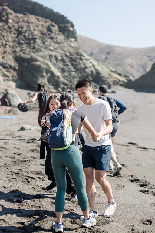 dude popping out of the rocks to surprise his girlfriend