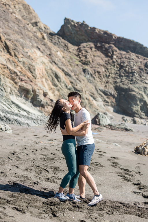 a candid, joyful moment after getting engaged
