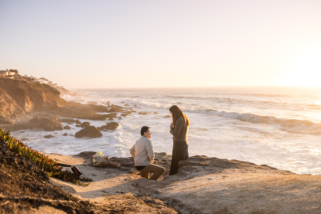 sunset surprise engagement on the Pacific Ocean bluffs