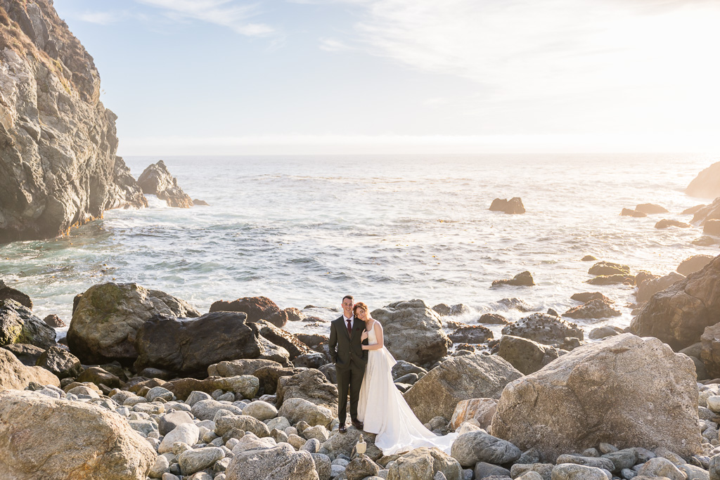 wide angle Partington Cove elopement portrait at sunset