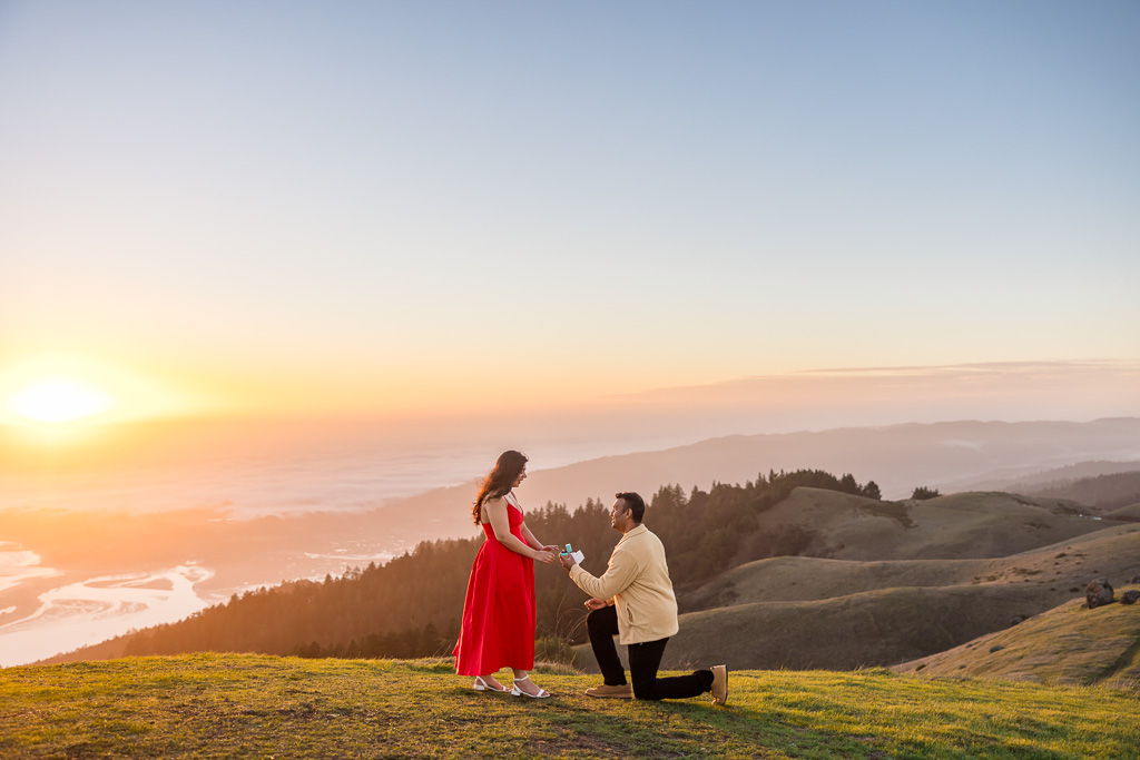 Mt Tam golden hour surprise proposal on green grassy hill