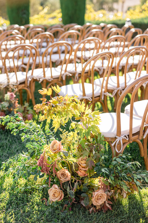 wooden chairs at ceremony