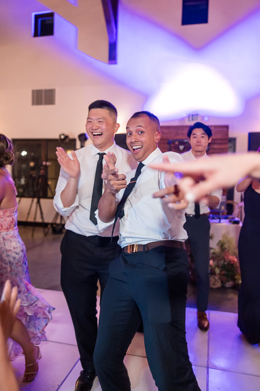 some guys having fun on the dance floor