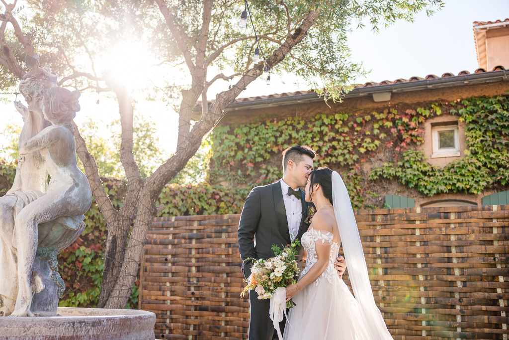 romantic photo by a stone fountain