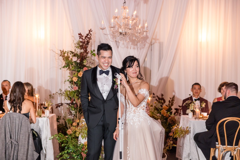 bride and groom giving a thank-you speech
