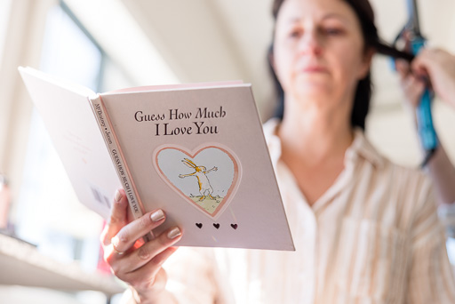 mother of the bride reading a 