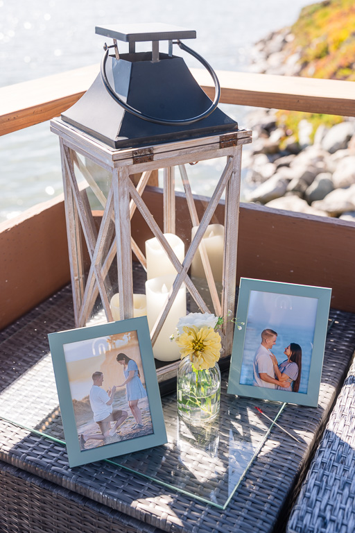 some wedding decor with proposal photos