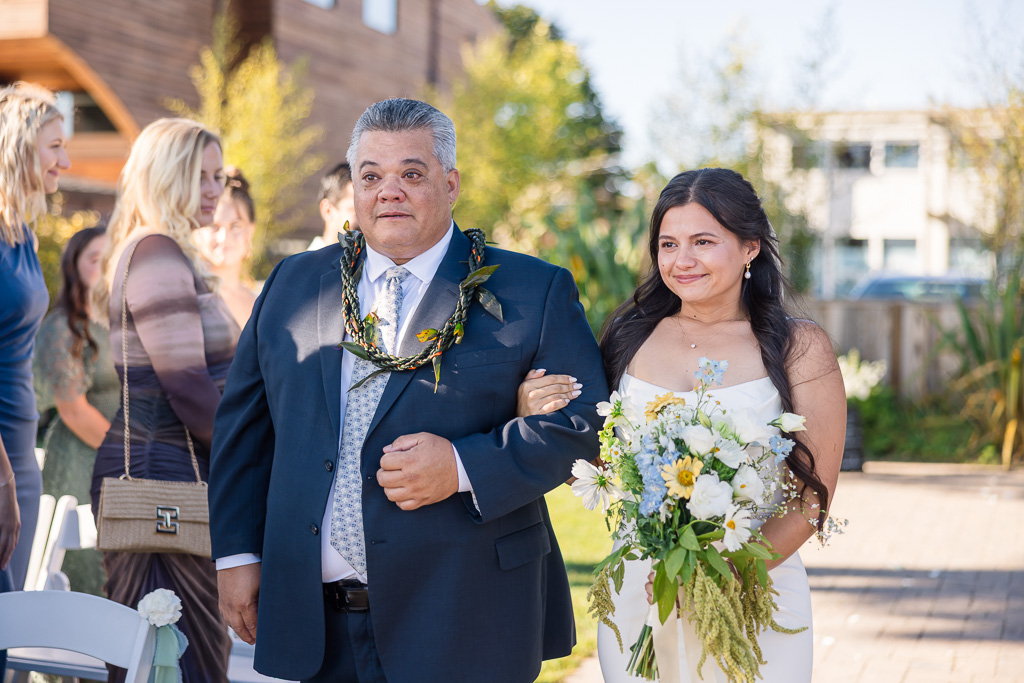 bride and tearful dad arrive at the altar