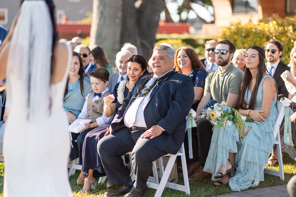 bride's parents happily in attendance of the wedding