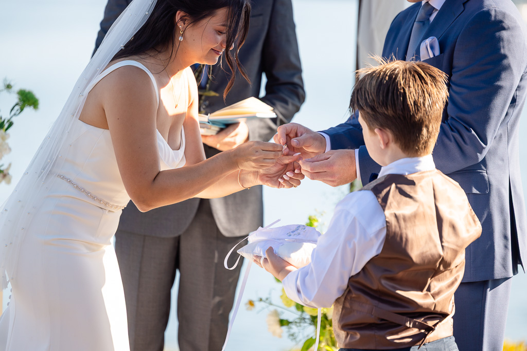 ringbearer delivering rings to the wedding ceremony