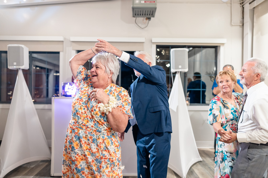 adorable old couple twirling