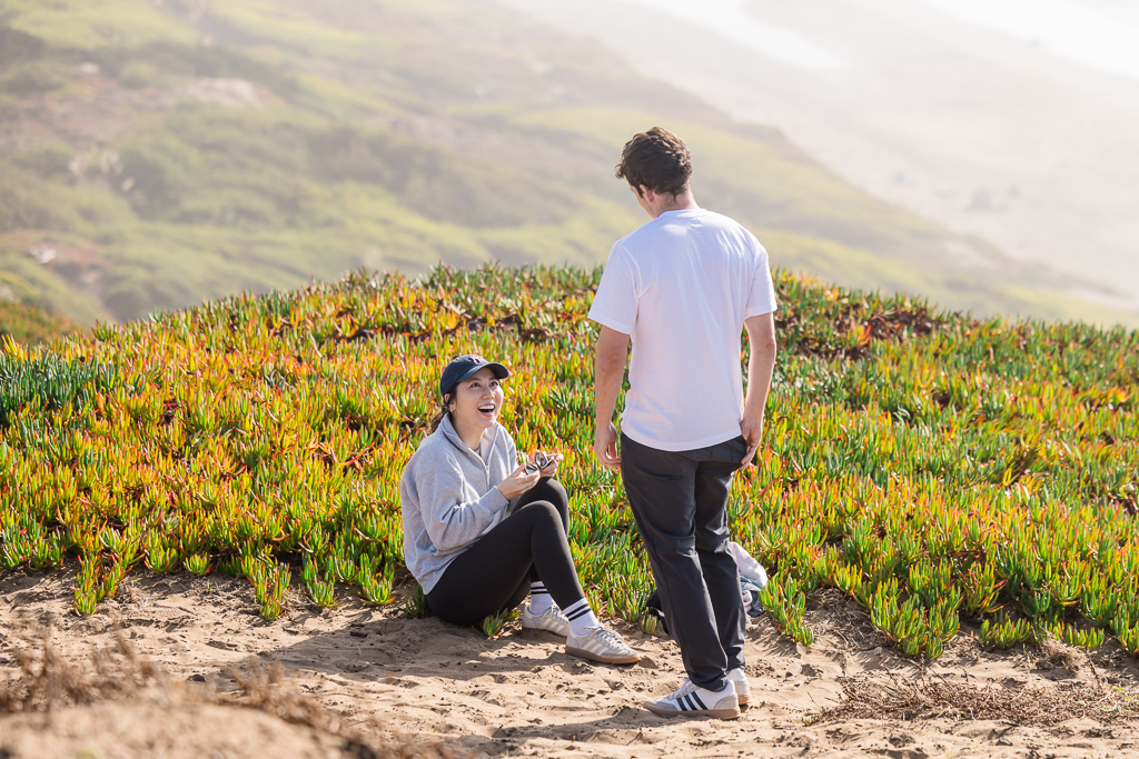 starting the surprise proposal speech while she's sitting down