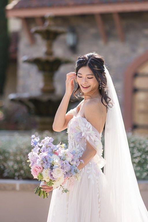bridal solo with soft pastel color bouquet