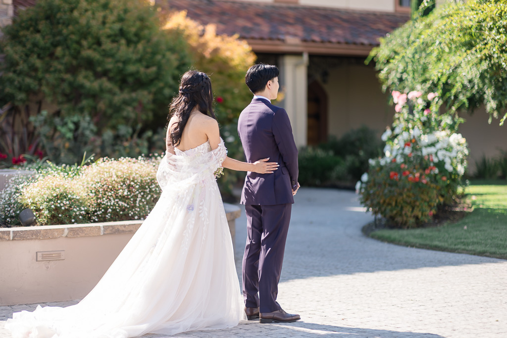 bride walking up to the groom for a first look