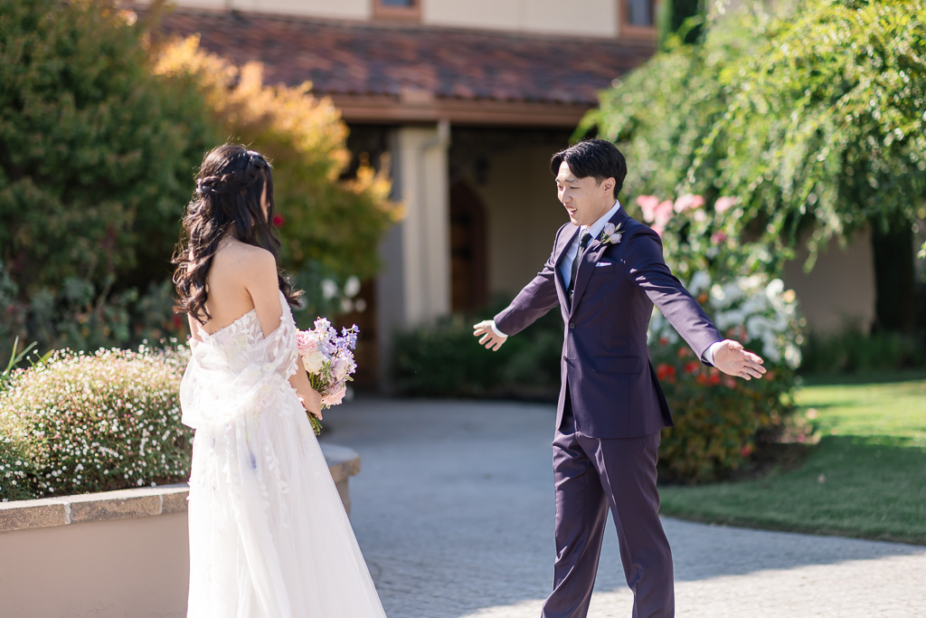 bride and groom great first look reaction
