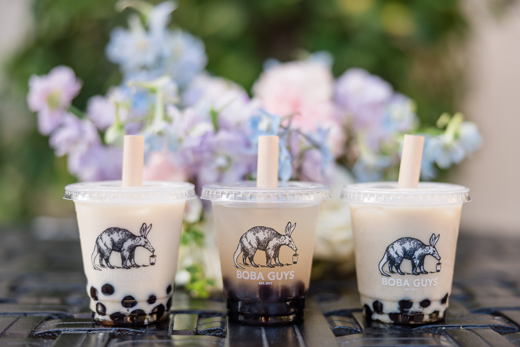 Boba Guys bubble tea drinks with wedding flowers