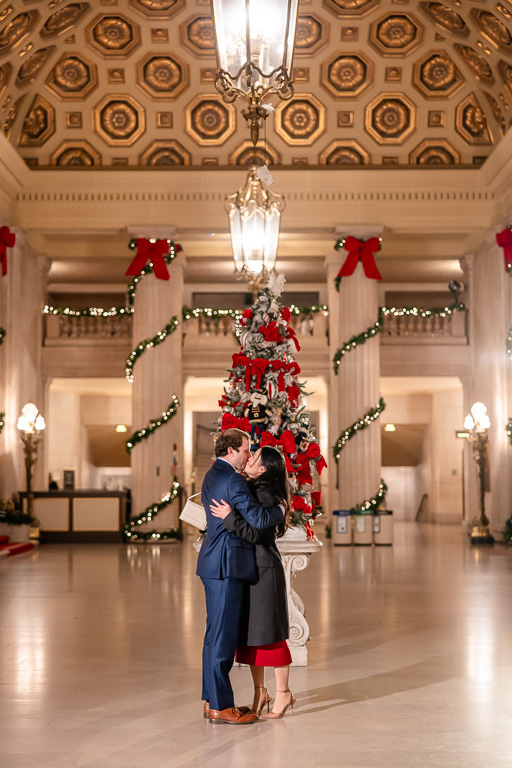 a couple inside the lobby of the SF War Memorial Opera House