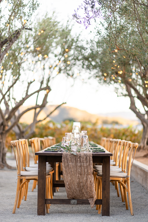 long wooden reception table at MOHI Ranch