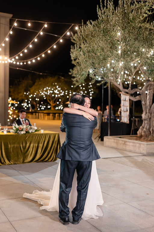 bride hugging dad
