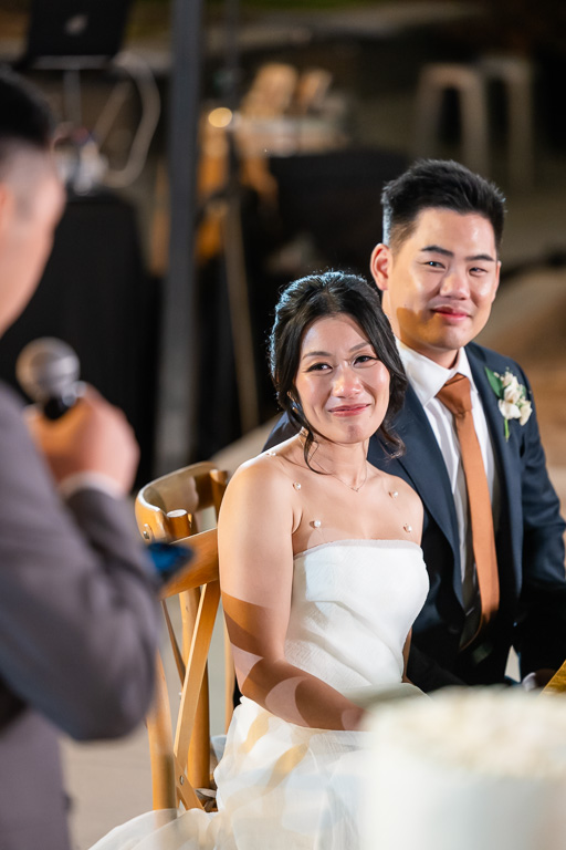 bride and groom reaction to groomsman speech
