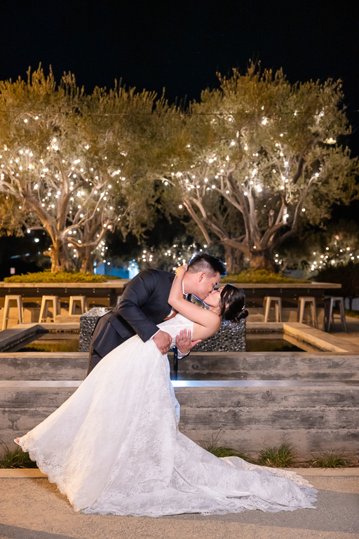 MOHI Ranch wedding portrait outside under the string lights at night