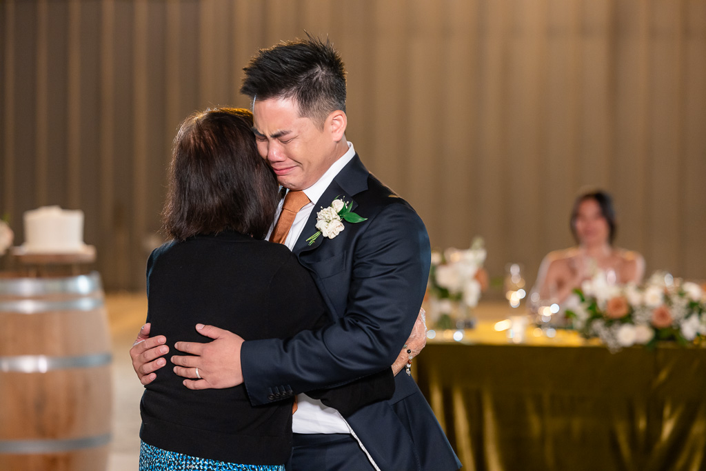 emotional moment of the groom dancing with grandma