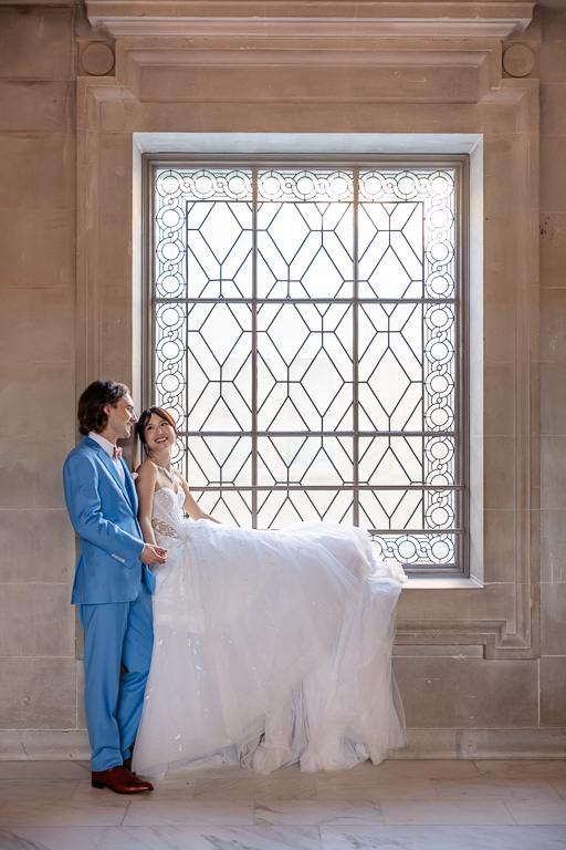 wedding photo sitting on SF City Hall window